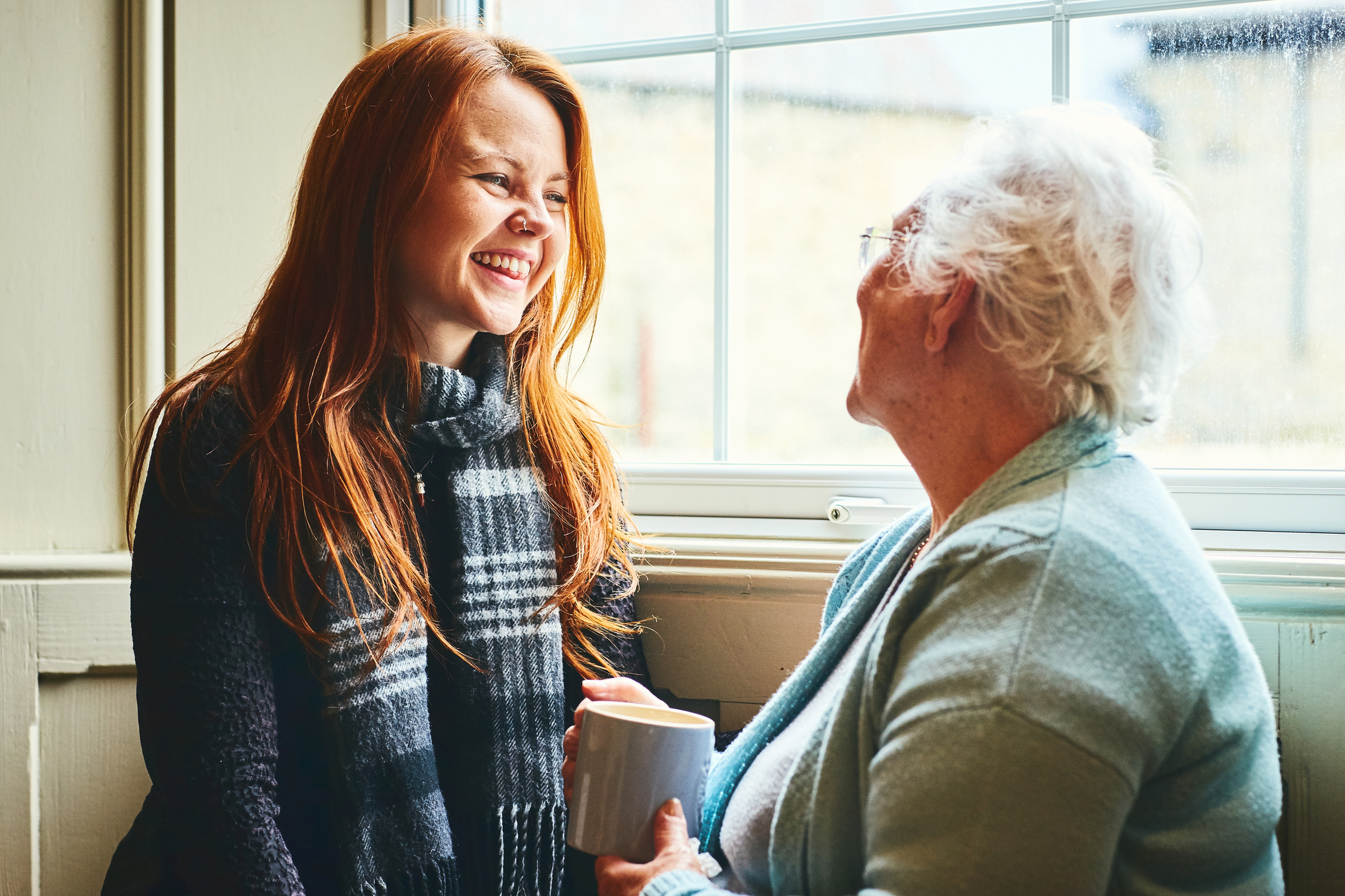 Caregiver and Senior Woman Talking